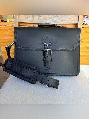 Saddleback Leather Co matte black leather briefcase for men